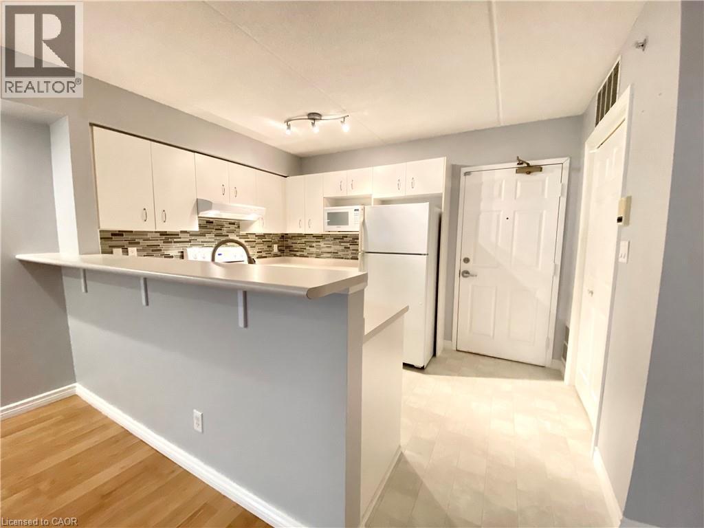 1450 Bishops Gate Unit# 209, Oakville, Ontario  L6M 4N1 - Photo 4 - 40812132