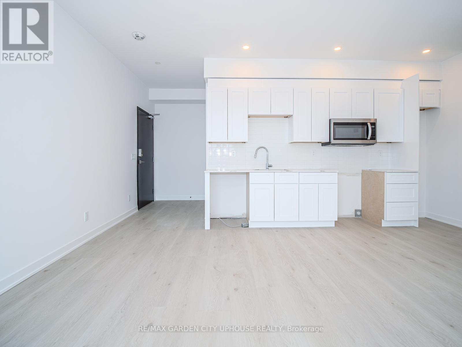 911 - 57 Carlisle Street, St. Catharines, Ontario  L2R 7N6 - Photo 3 - X12881598