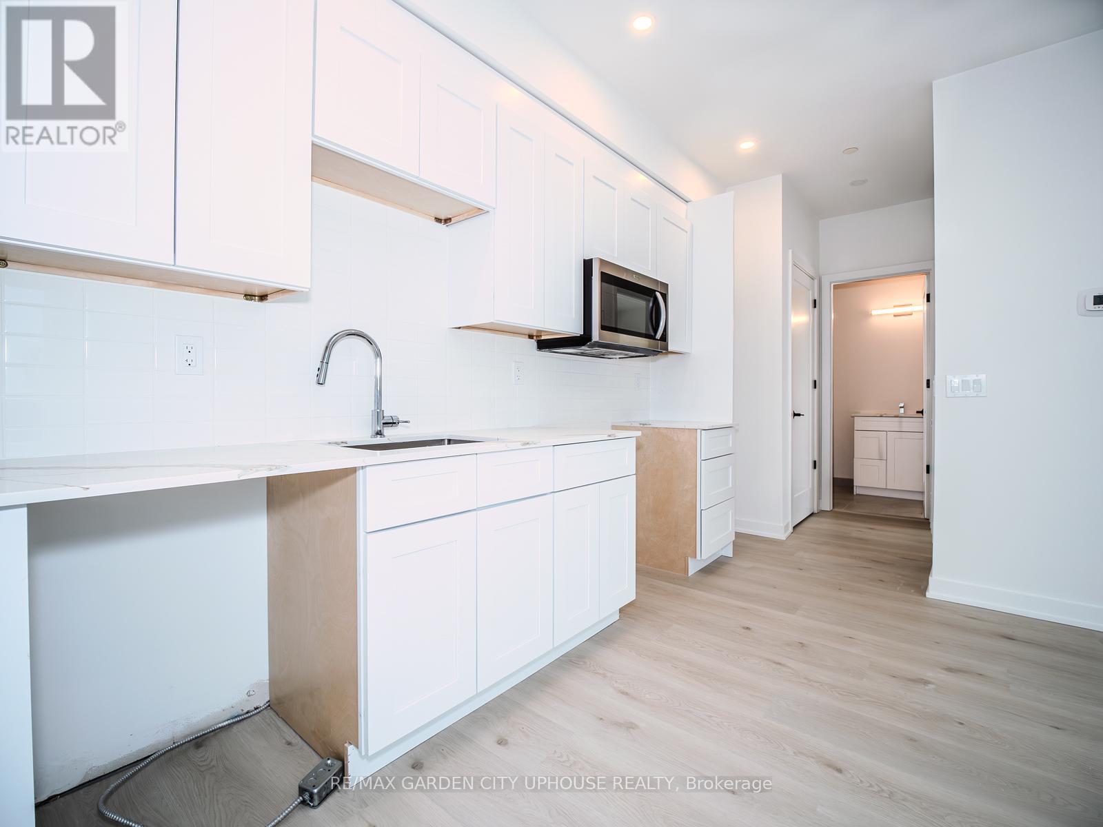 904 - 57 Carlisle Street, St. Catharines, Ontario  L2R 7N6 - Photo 3 - X12881660