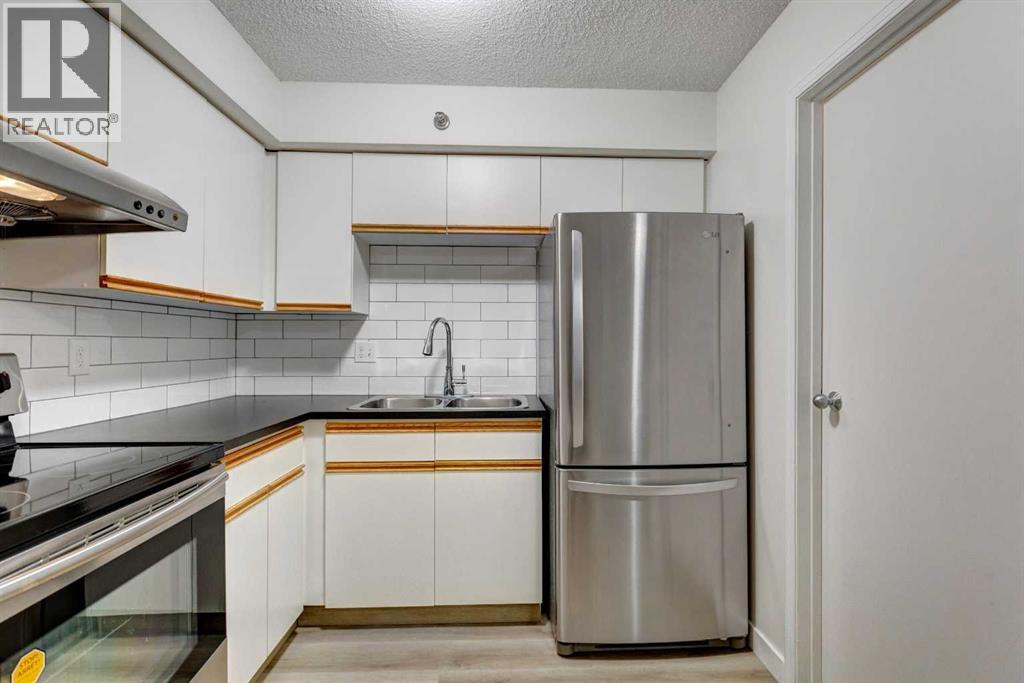 301, 128 2 Avenue Se, Calgary, Alberta  T2G 5J5 - Photo 9 - A2293136