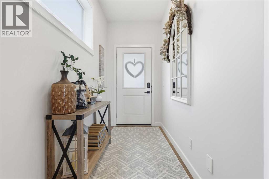 376 Fireside Way, Cochrane, Alberta  T4C 3B1 - Photo 5 - A2292325