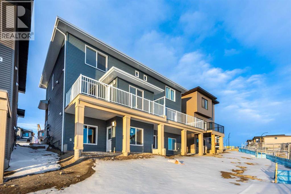 108 Heritage Manor, Cochrane, Alberta T4C 3K8 - Photo 3 - A2290928