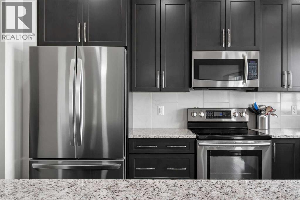 342 Reunion Green Nw, Airdrie, Alberta  T4B 3W5 - Photo 10 - A2292845