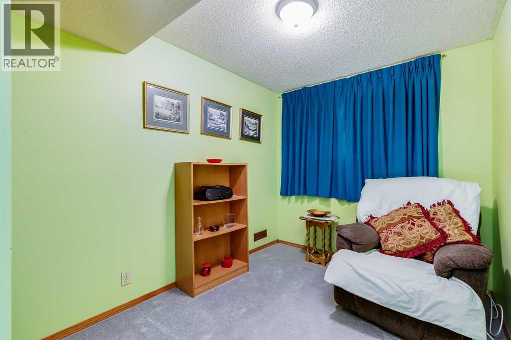 107 Bedwood Bay Ne, Calgary, Alberta  T3K 1M1 - Photo 18 - A2290457