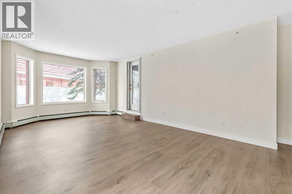 1103, 1103 Hawksbrow Point Nw, Calgary, Alberta  T3G 4C9 - Photo 4 - A2292667