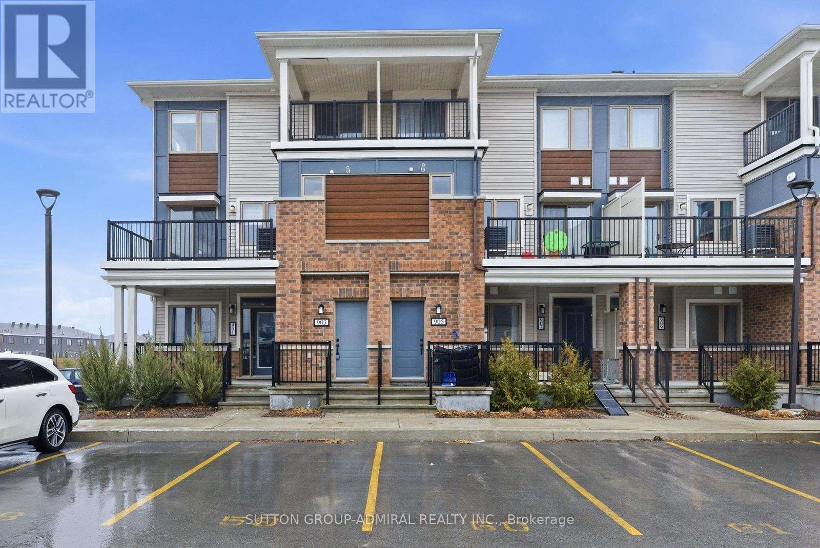 Rarely offered immaculate 1,330 sq. ft. upgraded truly move-in ready home! Private patio with BBQ on main level plus balcony off primary bedroom. Features smooth ceilings, pot lights, zebra blinds on every window, quartz countertops, stainless steel appliances, custom backsplash, and peninsula breakfast bar seating for four. Large-format bathroom tiles, main floor laundry, and primary bedroom spacious walk-in closet . Bright modern off-white kitchen with upgraded single-bowl sink and tall modern faucet. Freshly painted throughout with premium Sherwin-Williams paint in a designer-selected colour . Optional furniture package available for $3,500 for a convenient turn-key setup. (id:48254)