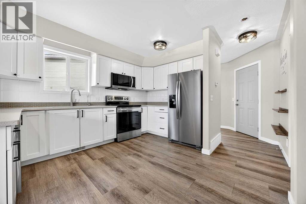 29 Ross Place, Crossfield, Alberta  T0M 0S0 - Photo 6 - A2292237