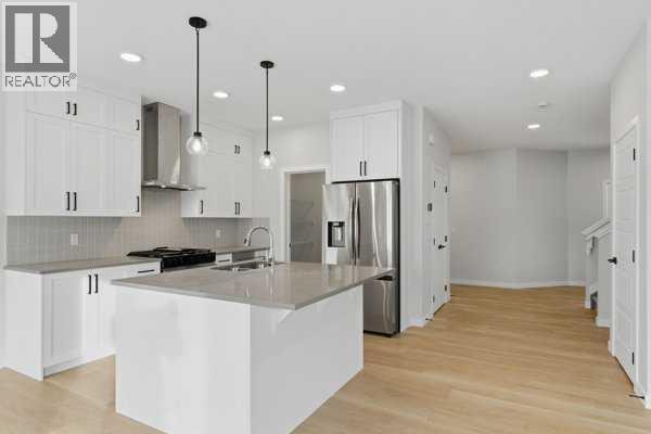 213 Bayview Park Sw, Airdrie, Alberta  T4B 4G2 - Photo 7 - A2292119