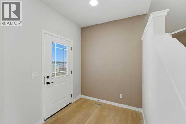 213 Bayview Park Sw, Airdrie, Alberta  T4B 4G2 - Photo 2 - A2292119