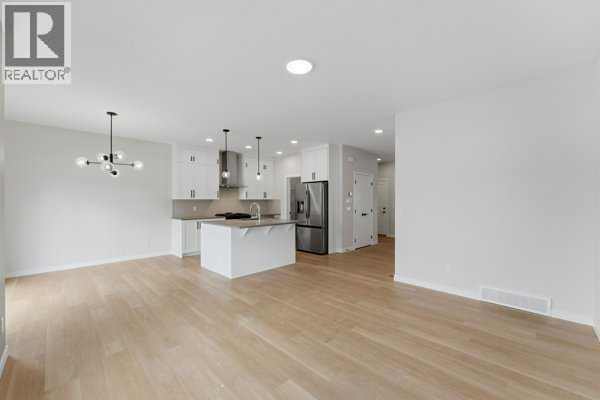 213 Bayview Park Sw, Airdrie, Alberta  T4B 4G2 - Photo 15 - A2292119