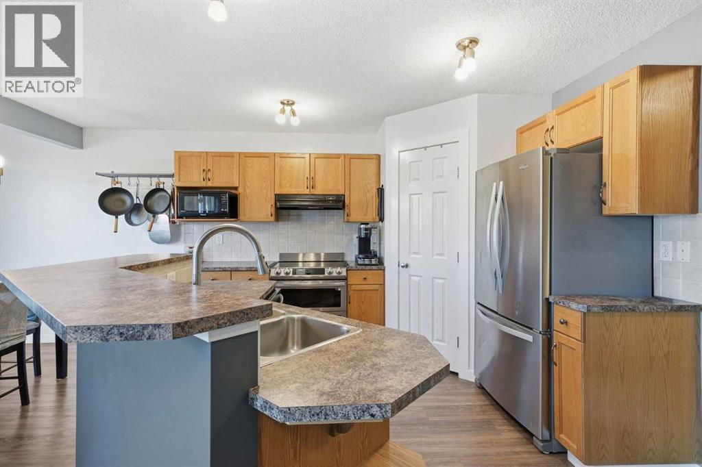 257 Covewood Circle Ne, Calgary, Alberta  T3K 5S8 - Photo 5 - A2287145