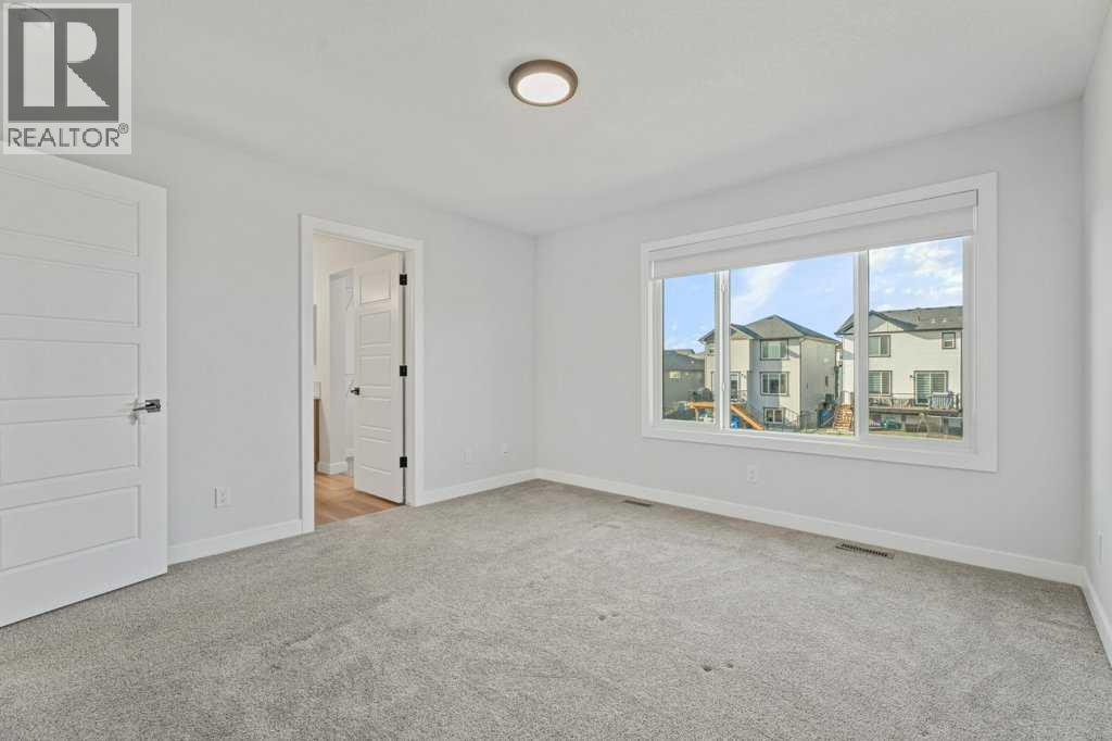 71 Ranchers View, Okotoks, Alberta  T1S 5R6 - Photo 24 - A2285159