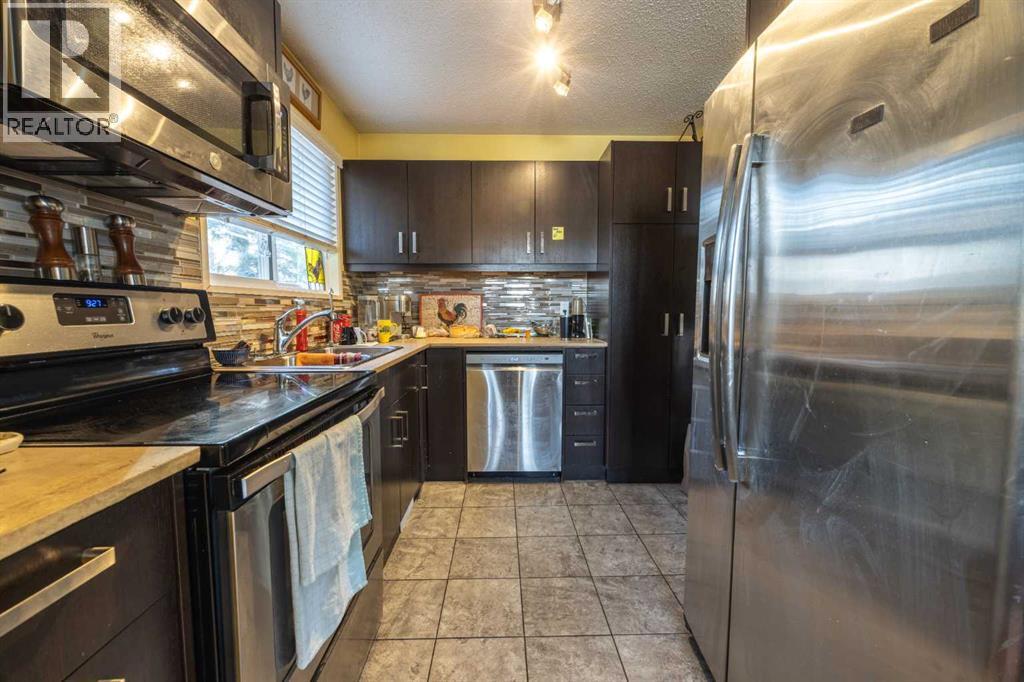 1206 Allen Street Se, Airdrie, Alberta  T4B 1B6 - Photo 4 - A2292868