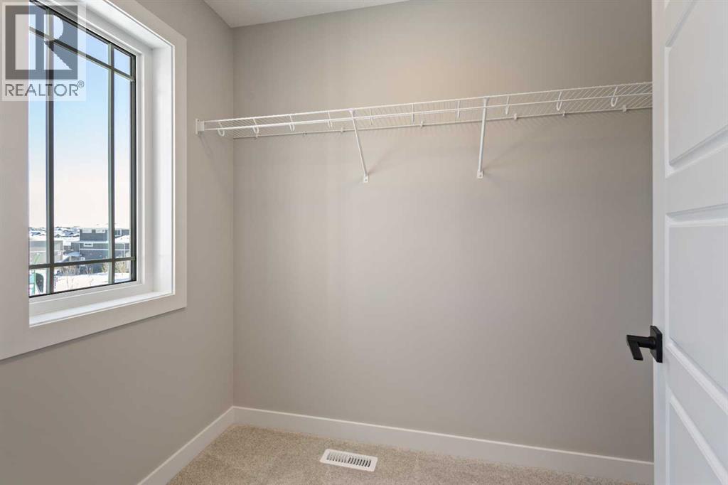 65 Amblefield Heights Nw, Calgary, Alberta  T3P 2K1 - Photo 20 - A2288185