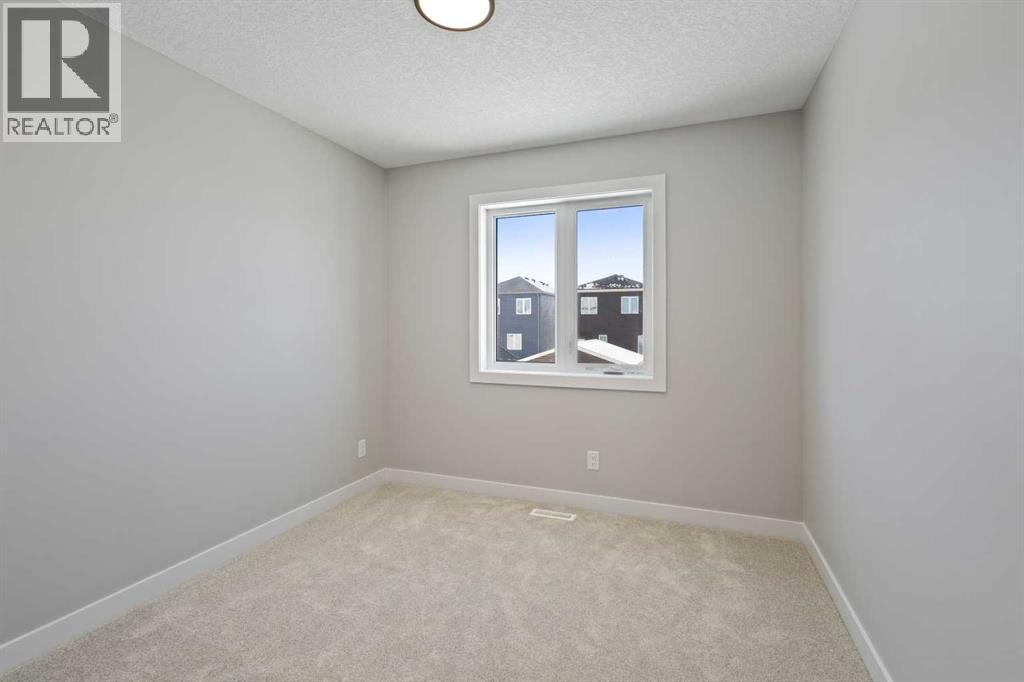 65 Amblefield Heights Nw, Calgary, Alberta  T3P 2K1 - Photo 22 - A2288185