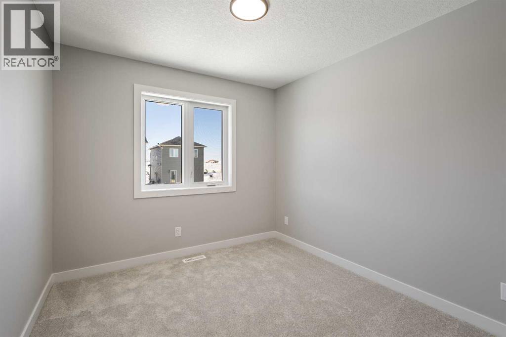 65 Amblefield Heights Nw, Calgary, Alberta  T3P 2K1 - Photo 25 - A2288185