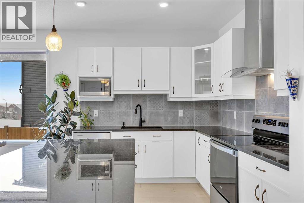 76 Edith Mews Nw, Calgary, Alberta  T3R 1S6 - Photo 13 - A2292373