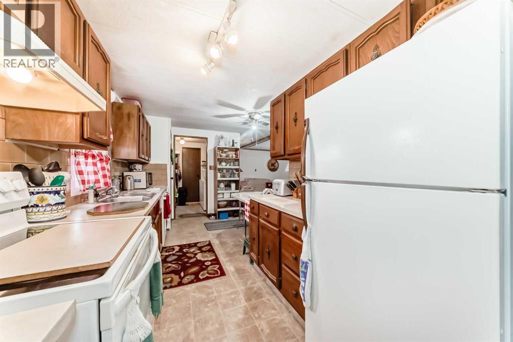 99, 99 Arbour Lake Road NW, Calgary, Alberta  T3G 4E4 - Photo 4 - A2291246