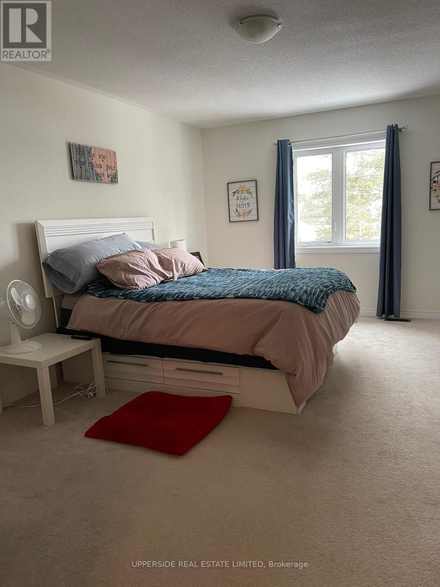 32 Greenwood Drive, Essa, Ontario  L0M 1B4 - Photo 9 - N12883794