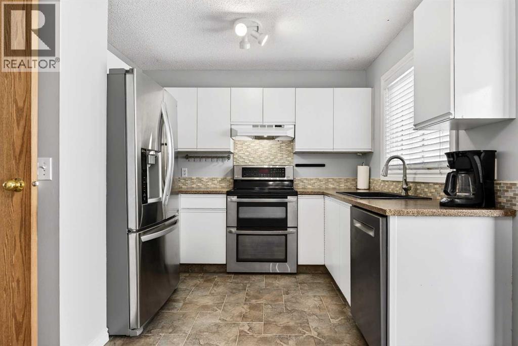 10884 Hidden Valley Drive Nw, Calgary, Alberta  T3A 5H2 - Photo 11 - A2290313