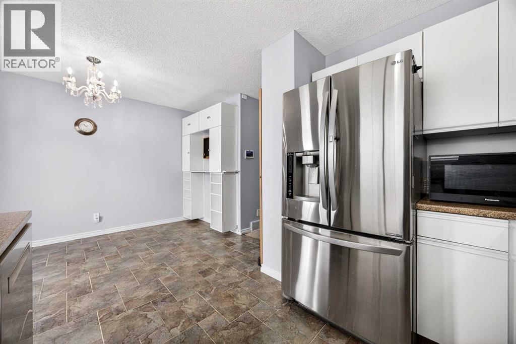 10884 Hidden Valley Drive Nw, Calgary, Alberta  T3A 5H2 - Photo 9 - A2290313