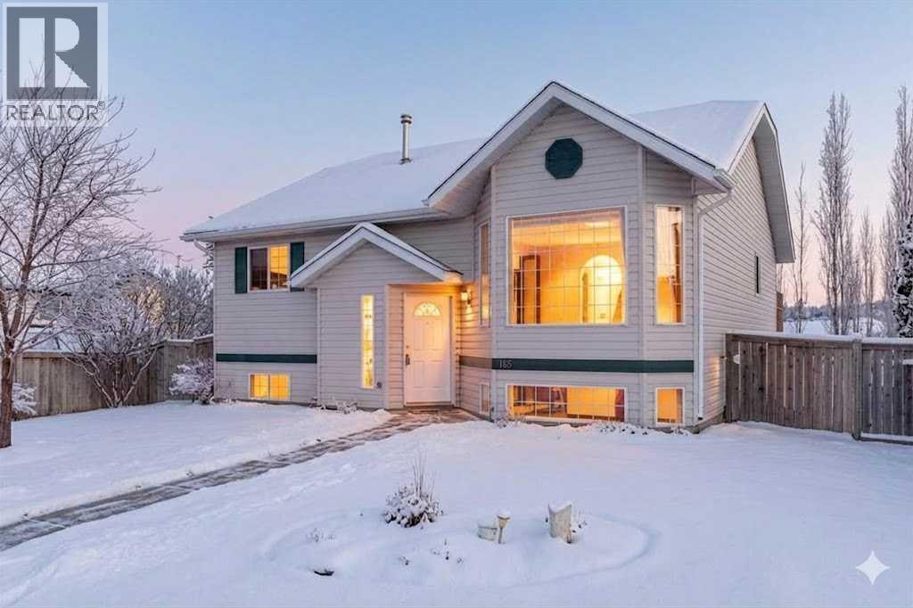 165 Quigley Drive, Cochrane, Alberta  T4C 1R4 - Photo 1 - A2290069