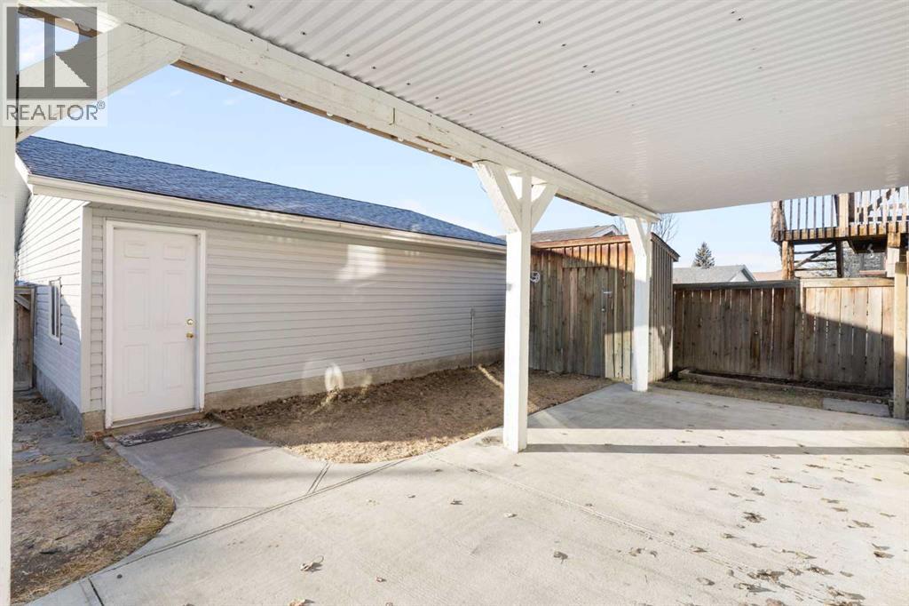 165 Quigley Drive, Cochrane, Alberta  T4C 1R4 - Photo 41 - A2290069