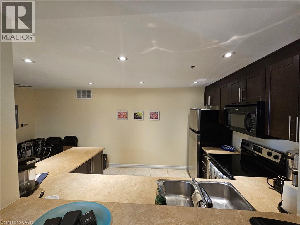 308 Watson Parkway N Unit# 102, Guelph, Ontario N1E 0G7 - Photo 34 - 40809663