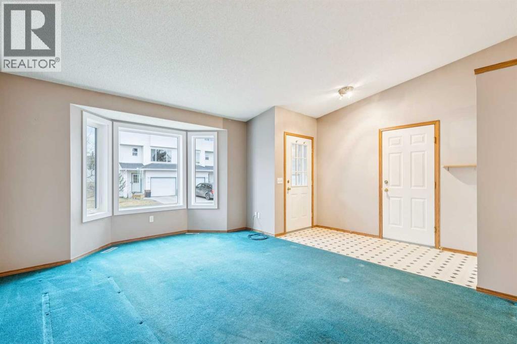 42 Harvest Oak Circle Ne, Calgary, Alberta T3K 4S6 - Photo 5 - A2284275