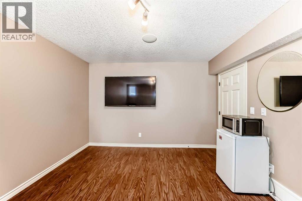 1301 Ravenswood Drive Se, Airdrie, Alberta  T4A 0J4 - Photo 40 - A2292085