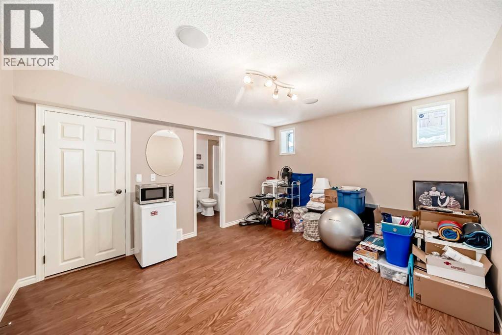 1301 Ravenswood Drive Se, Airdrie, Alberta  T4A 0J4 - Photo 41 - A2292085