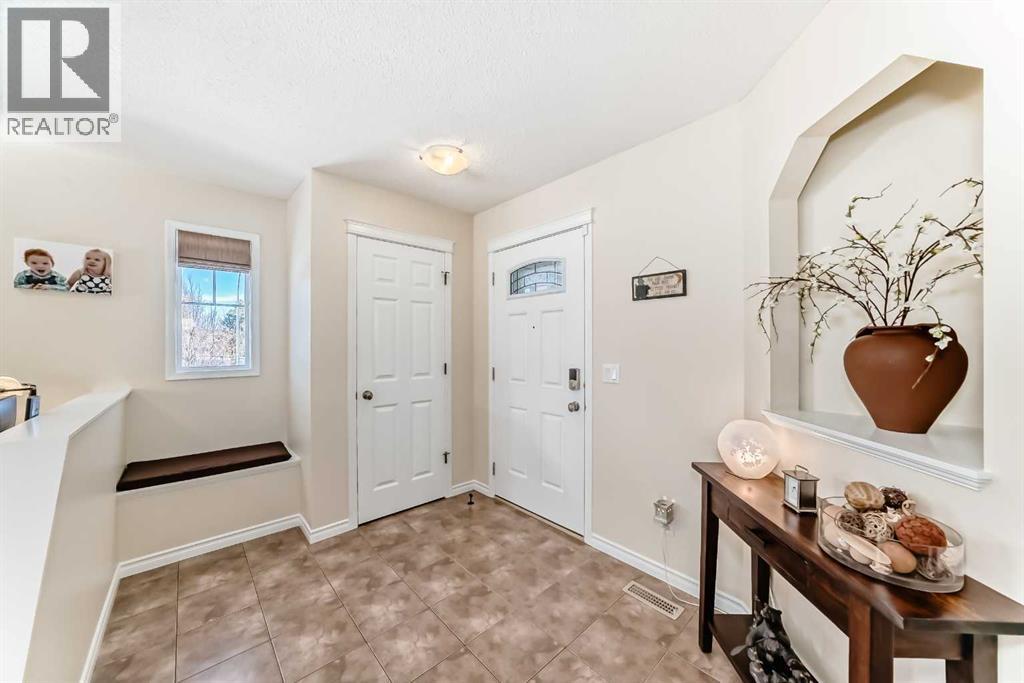 1301 Ravenswood Drive Se, Airdrie, Alberta  T4A 0J4 - Photo 3 - A2292085