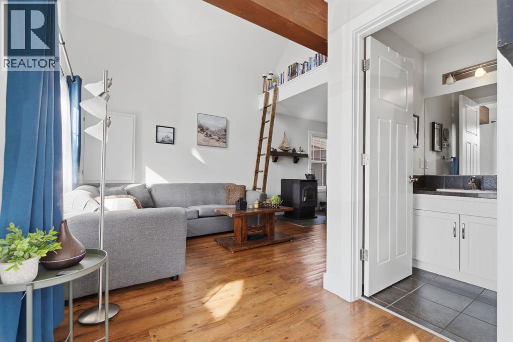 212 Cottageclub Crescent, Rural Rocky View County, Alberta T2K 1B3 - Photo 7 - A2291790