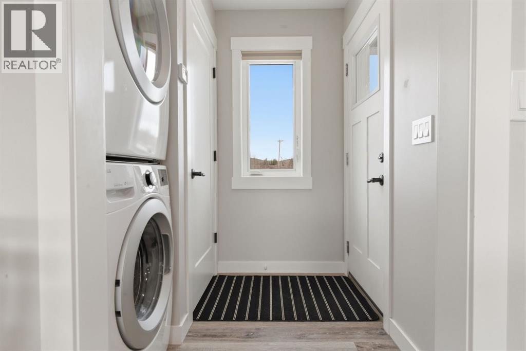 212 Cottageclub Crescent, Rural Rocky View County, Alberta T2K 1B3 - Photo 28 - A2291790