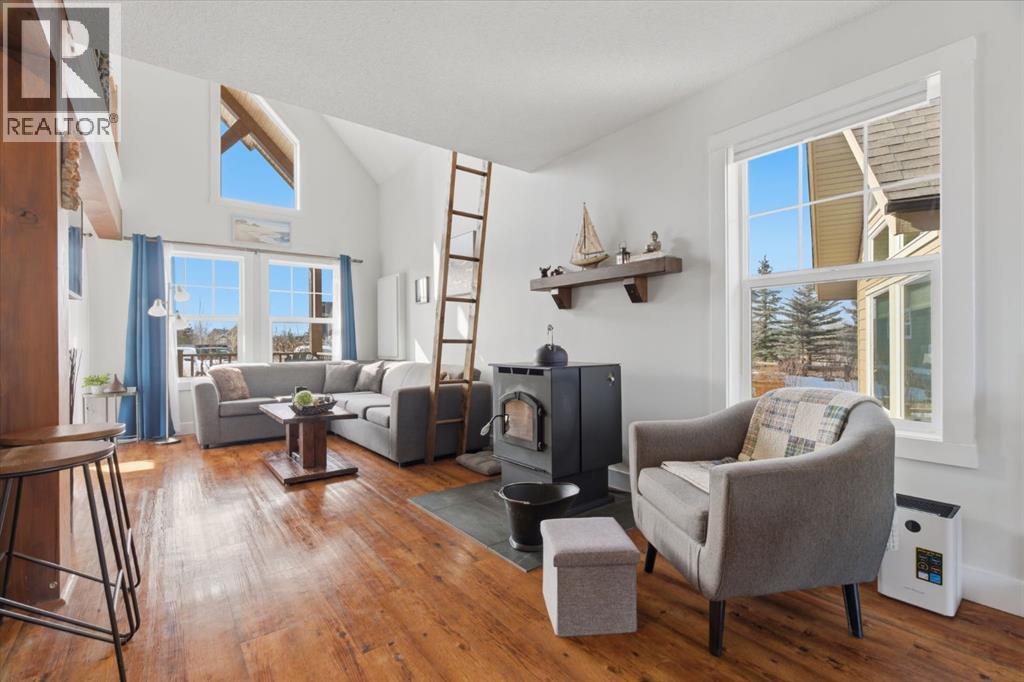 212 Cottageclub Crescent, Rural Rocky View County, Alberta T2K 1B3 - Photo 8 - A2291790