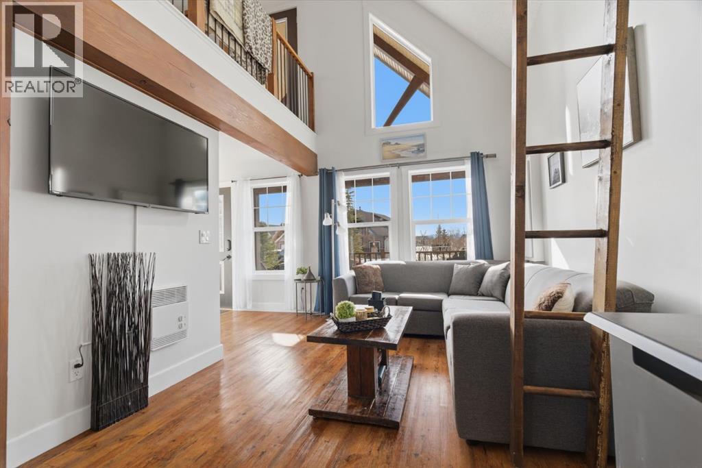 212 Cottageclub Crescent, Rural Rocky View County, Alberta T2K 1B3 - Photo 2 - A2291790