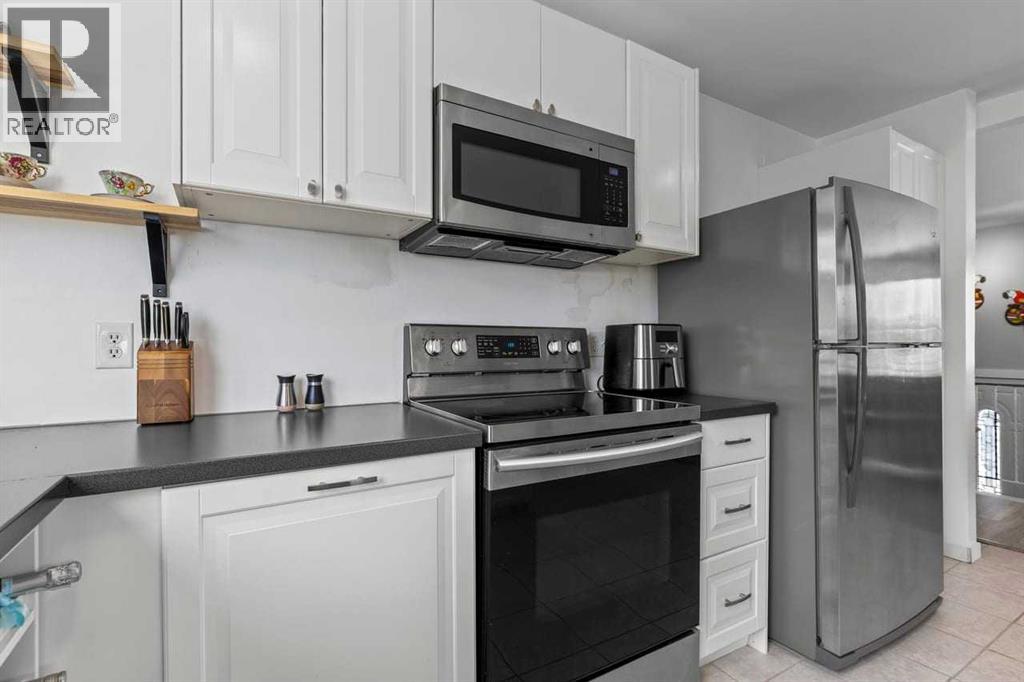 436 Queen Charlotte Road Se, Calgary, Alberta  T2H 4H7 - Photo 8 - A2293139