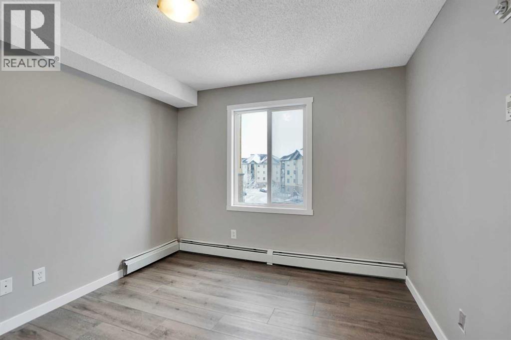 8302, 304 Mackenzie Way Sw, Airdrie, Alberta T4B 3H6 - Photo 12 - A2292420