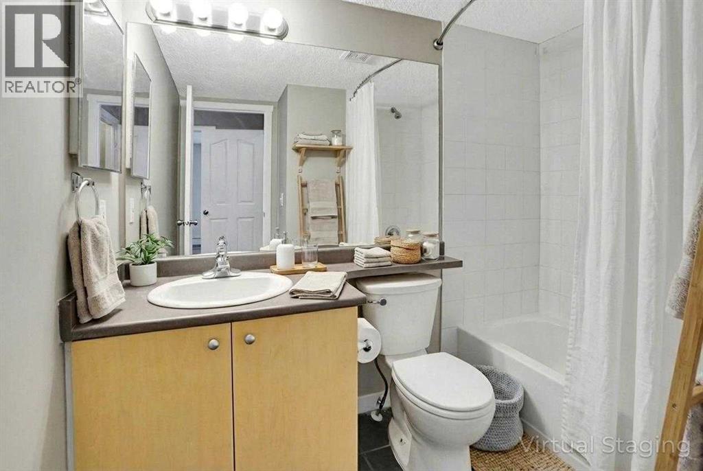 8302, 304 Mackenzie Way Sw, Airdrie, Alberta T4B 3H6 - Photo 7 - A2292420