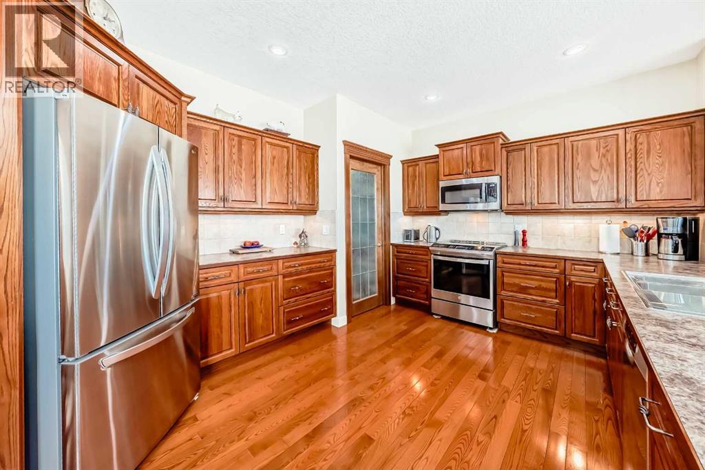 487 Rocky Ridge Drive Nw, Calgary, Alberta  T3G 5C3 - Photo 3 - A2290057