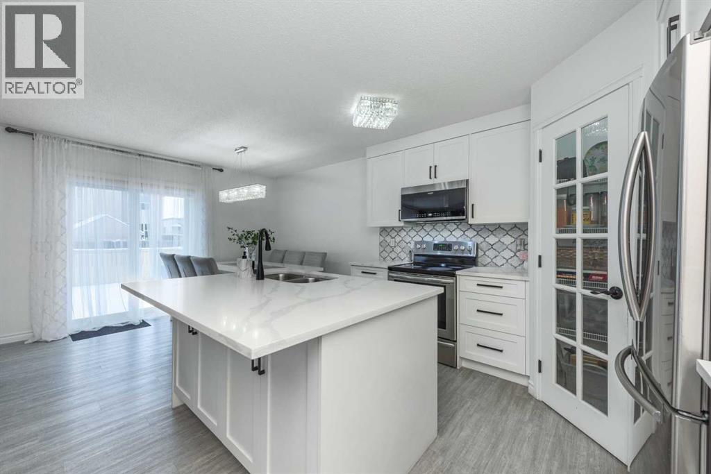 8430 Saddleridge Drive Ne, Calgary, Alberta  t3j 4w9 - Photo 3 - A2293529