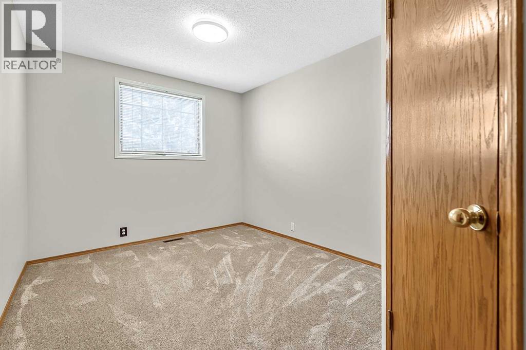 23 Sunset Crescent, Okotoks, Alberta  T1S 1P3 - Photo 23 - A2291099