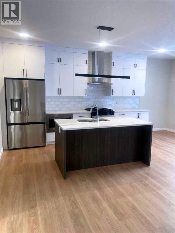 9 Bayview Mews Sw, Airdrie, Alberta  T4B 5P1 - Photo 5 - A2293386