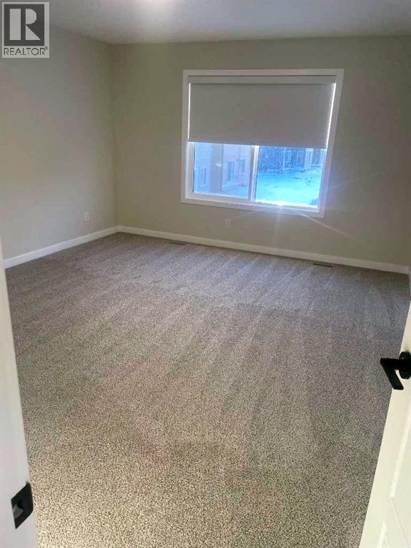 9 Bayview Mews Sw, Airdrie, Alberta  T4B 5P1 - Photo 19 - A2293386