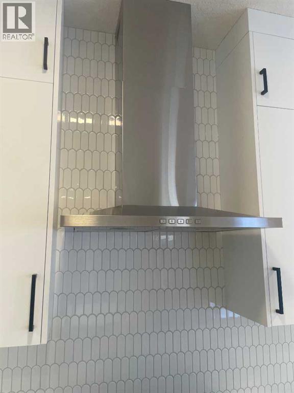 9 Bayview Mews Sw, Airdrie, Alberta  T4B 5P1 - Photo 7 - A2293386