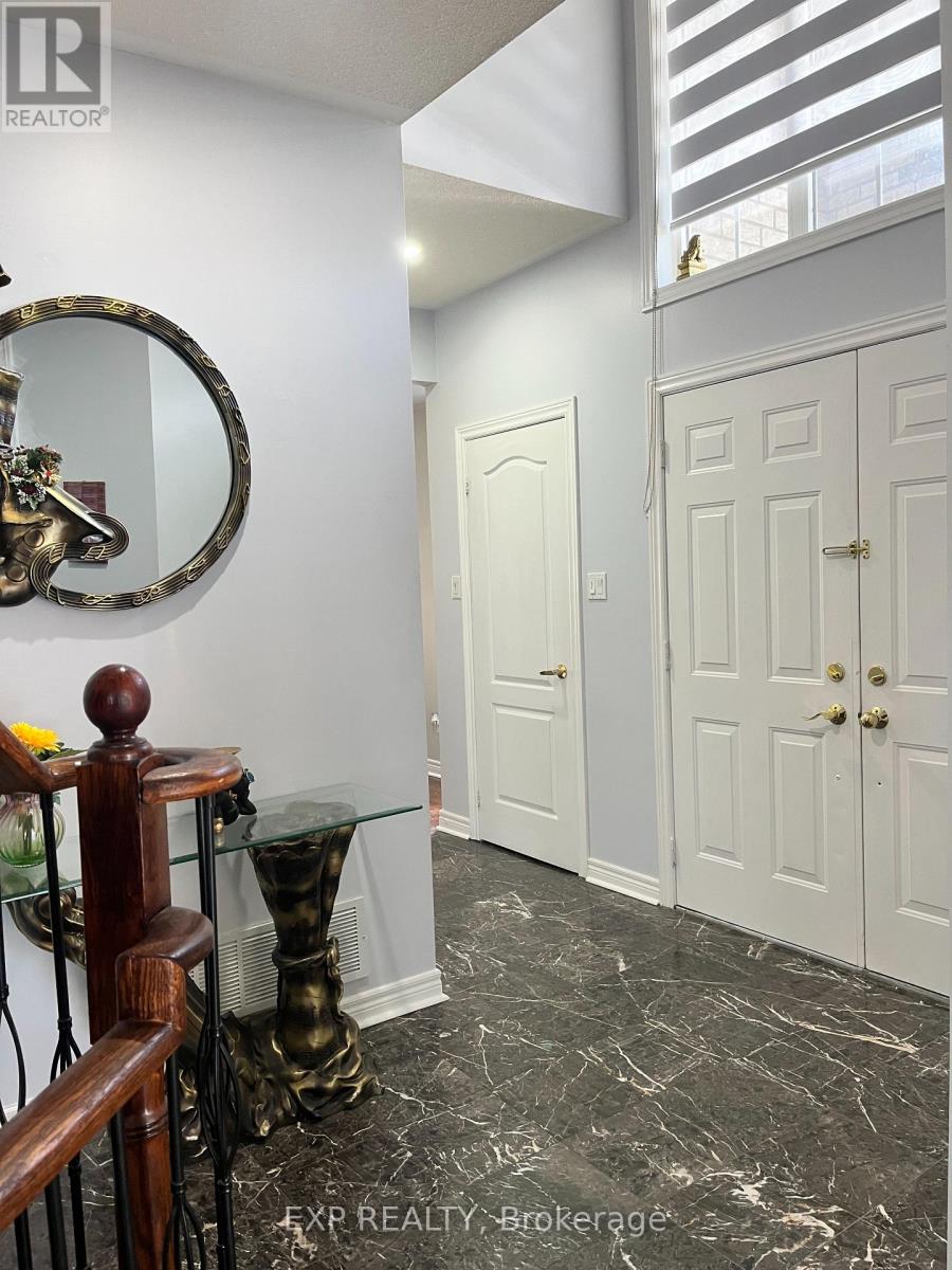 129 Ledge Rock Drive, Vaughan, Ontario  L4H 2G7 - Photo 6 - N12885420