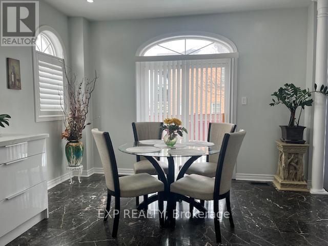 129 Ledge Rock Drive, Vaughan, Ontario  L4H 2G7 - Photo 8 - N12885420