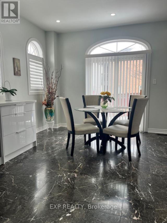 129 Ledge Rock Drive, Vaughan, Ontario  L4H 2G7 - Photo 9 - N12885420