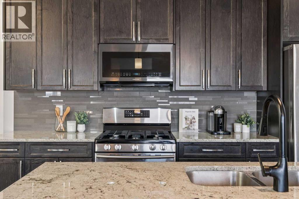 58 Buckskin Way, Cochrane, Alberta  T4C 2P2 - Photo 4 - A2288963