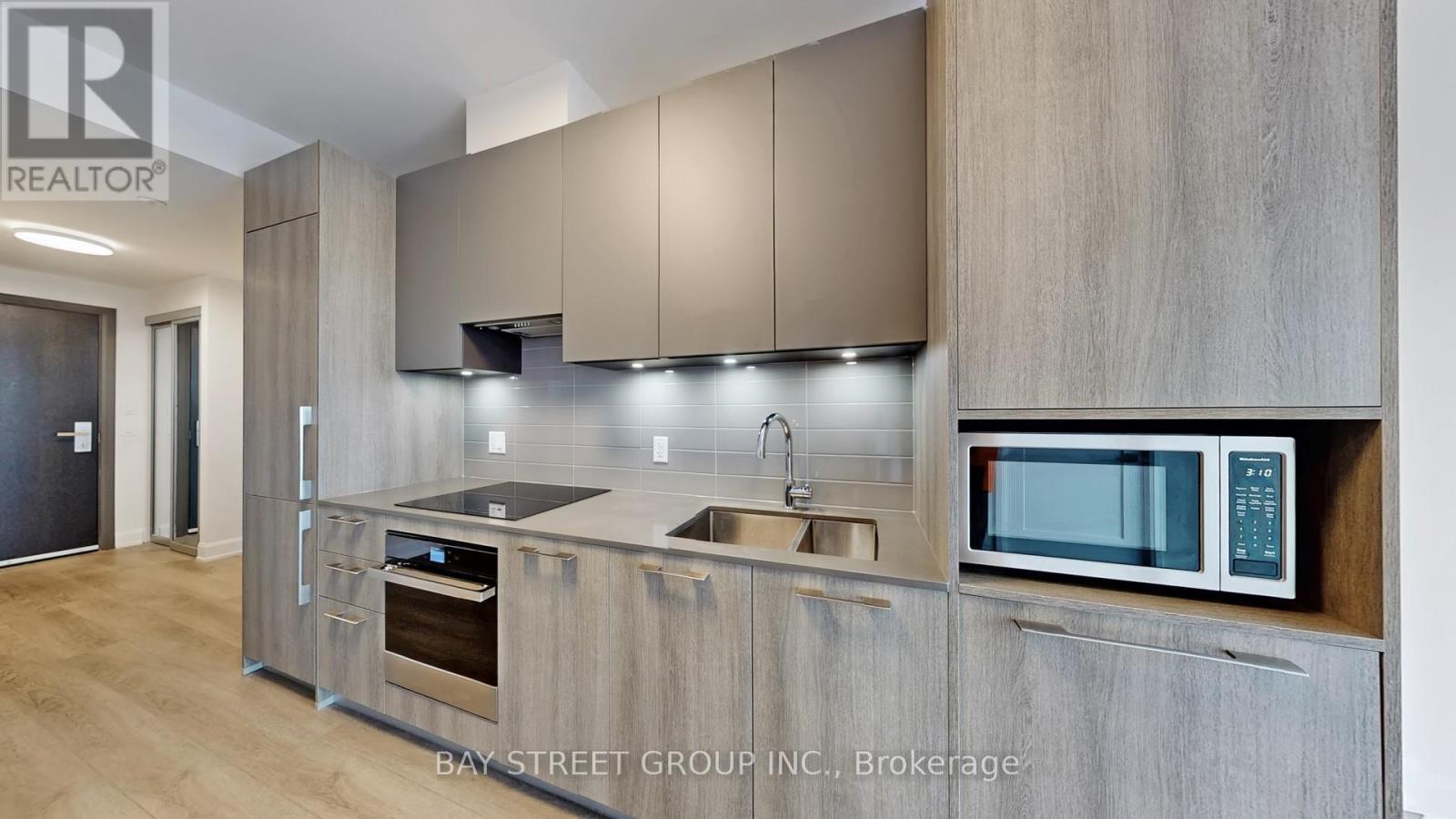 202 - 18 Water Walk Drive, Markham (Unionville), Ontario  L3R 6L5 - Photo 13 - N12885478